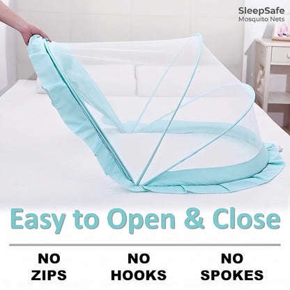 SleepSafe net on a bed with the mesh flap lifted for zip-free side entry